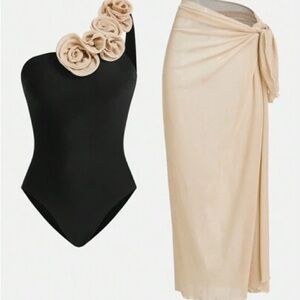 Elegant Black One-Shoulder Swimsuit with Cream Floral Detail